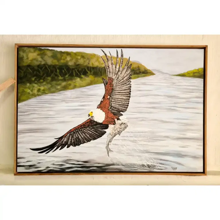 A picture of a fish eagle catching a fish in a river.